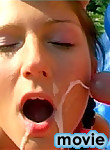 Cute sweetheart receiving cum on face by the swimming pool