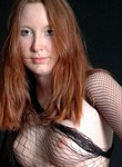 Shy Real Redhead Exposed Nakedness Wrapped in Revealing Fishnet