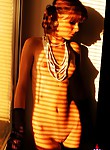 Sexy redhead with pigtails totally nude